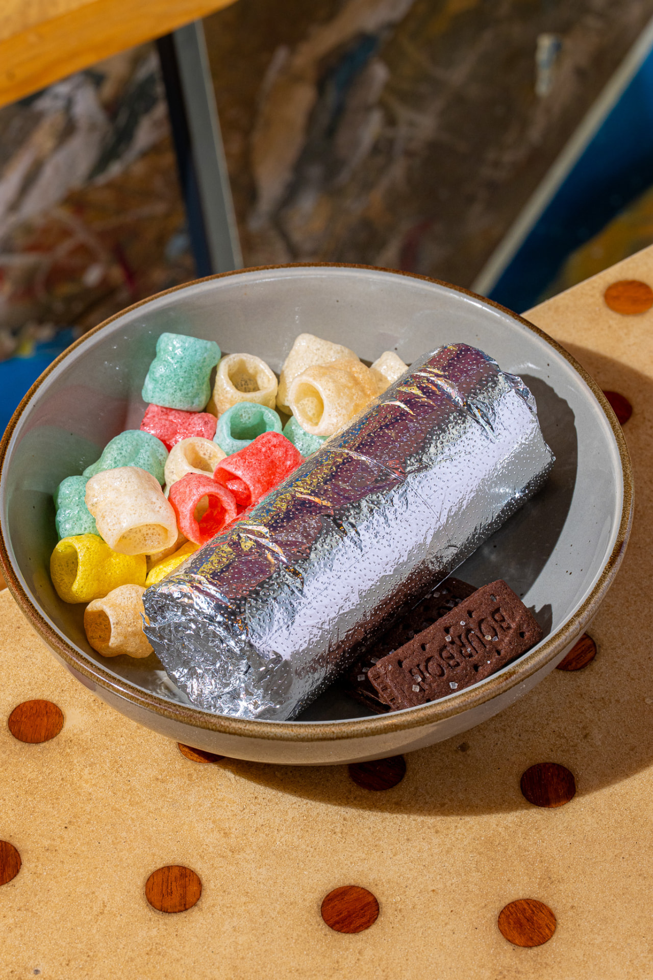 Kids burrito in a bowl with fryums and a bourbon biscuit