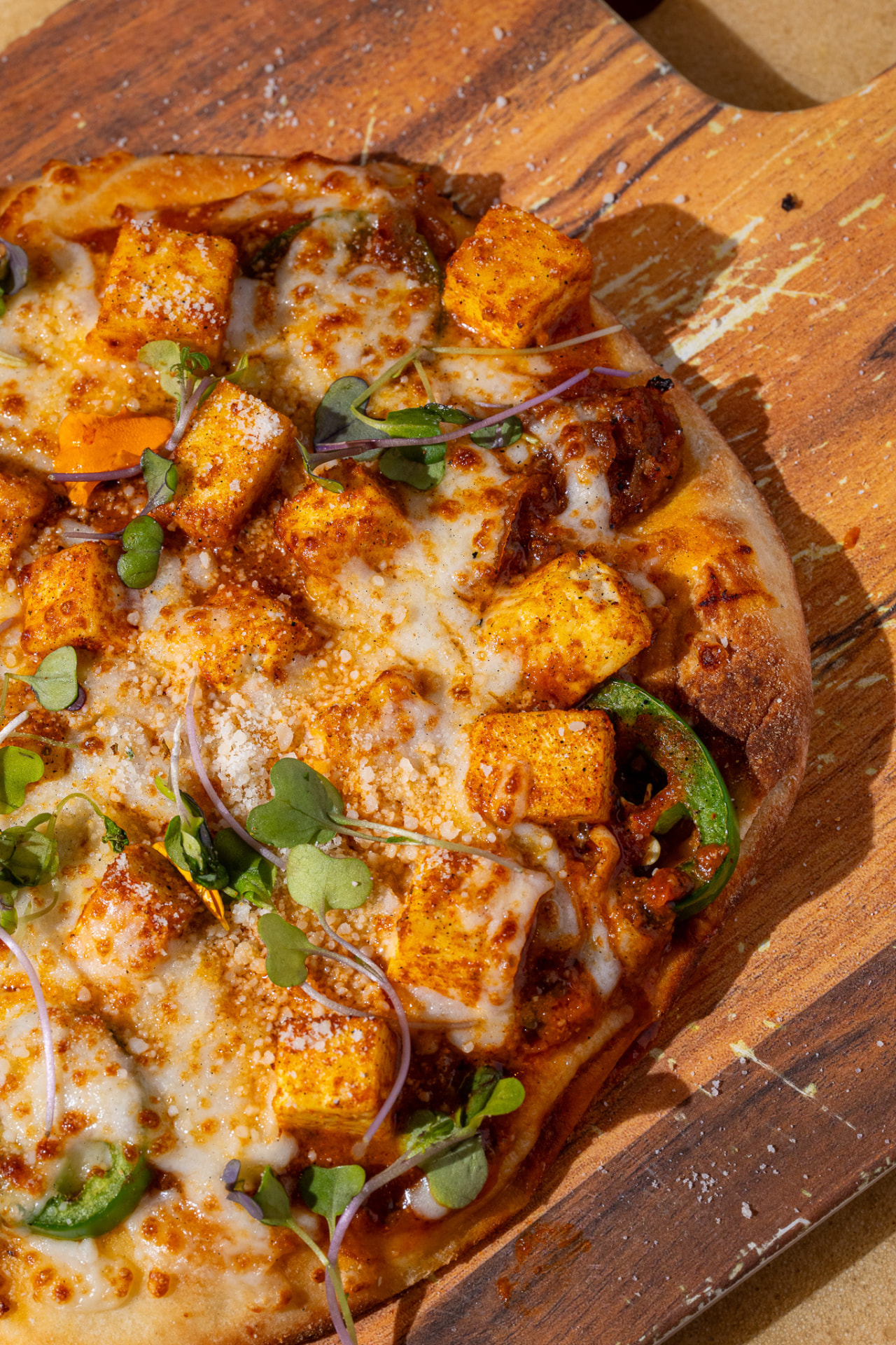 Paneer Naughty Naan, close up with jalapeno