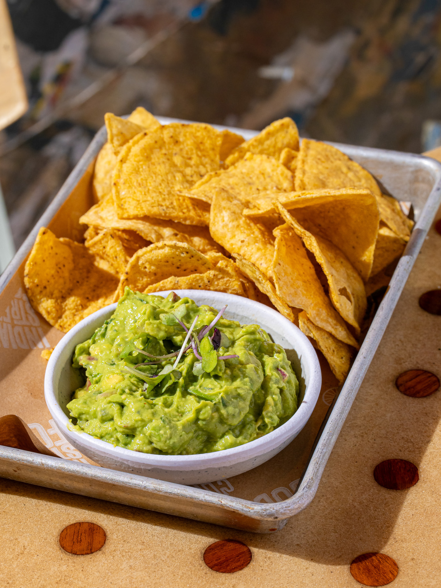 Guac and chips in the basket