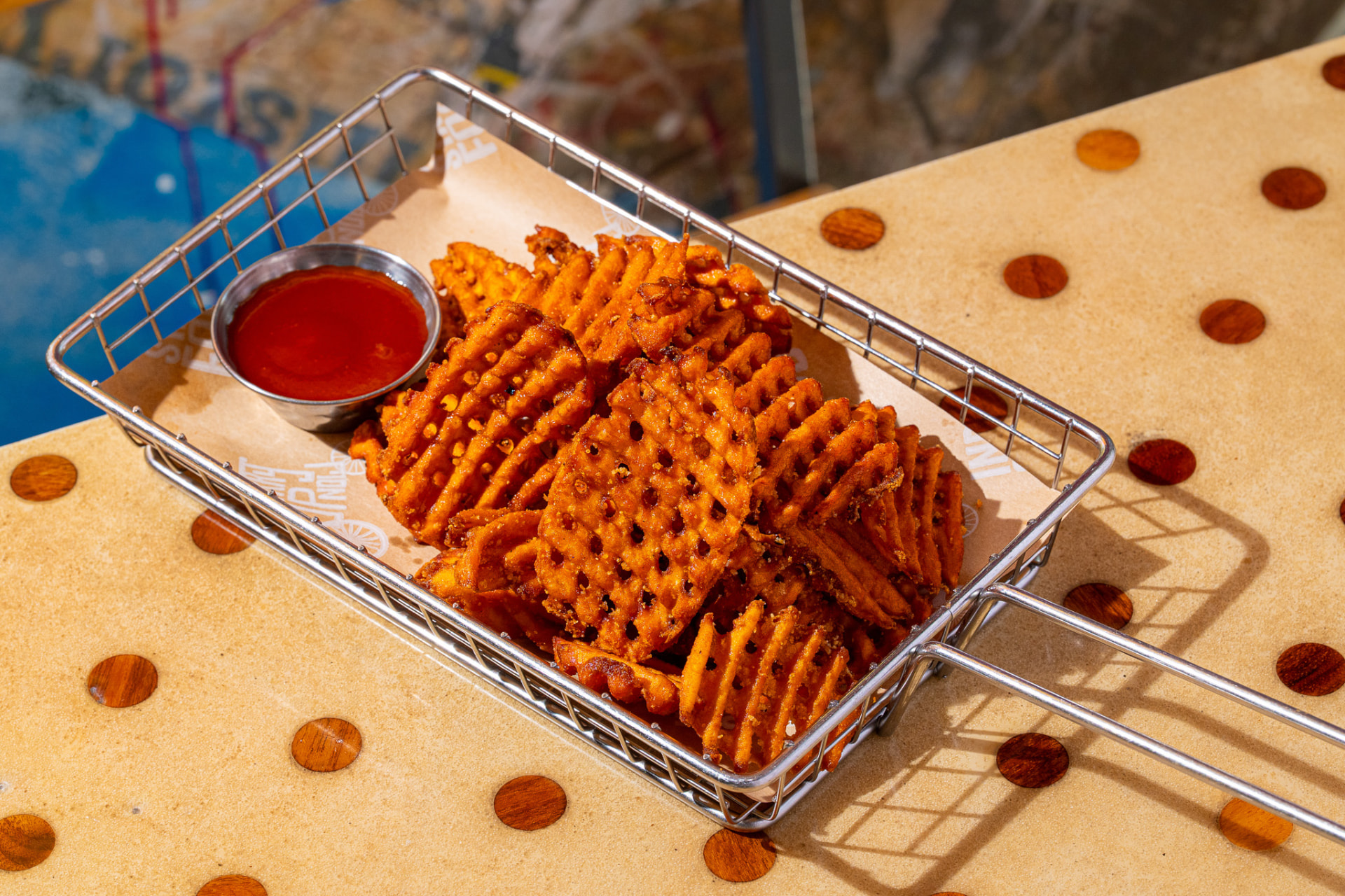 Sweet potato waffle fries in the basket