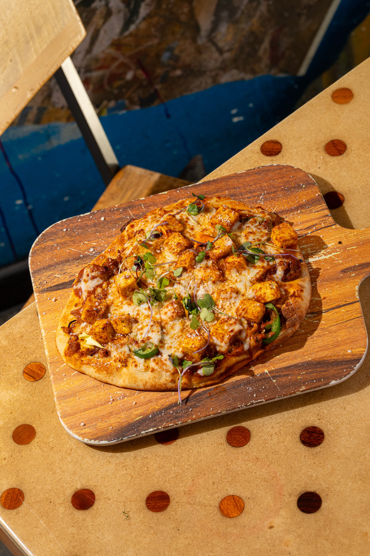 Paneer Naughty Naan on the board, overhead