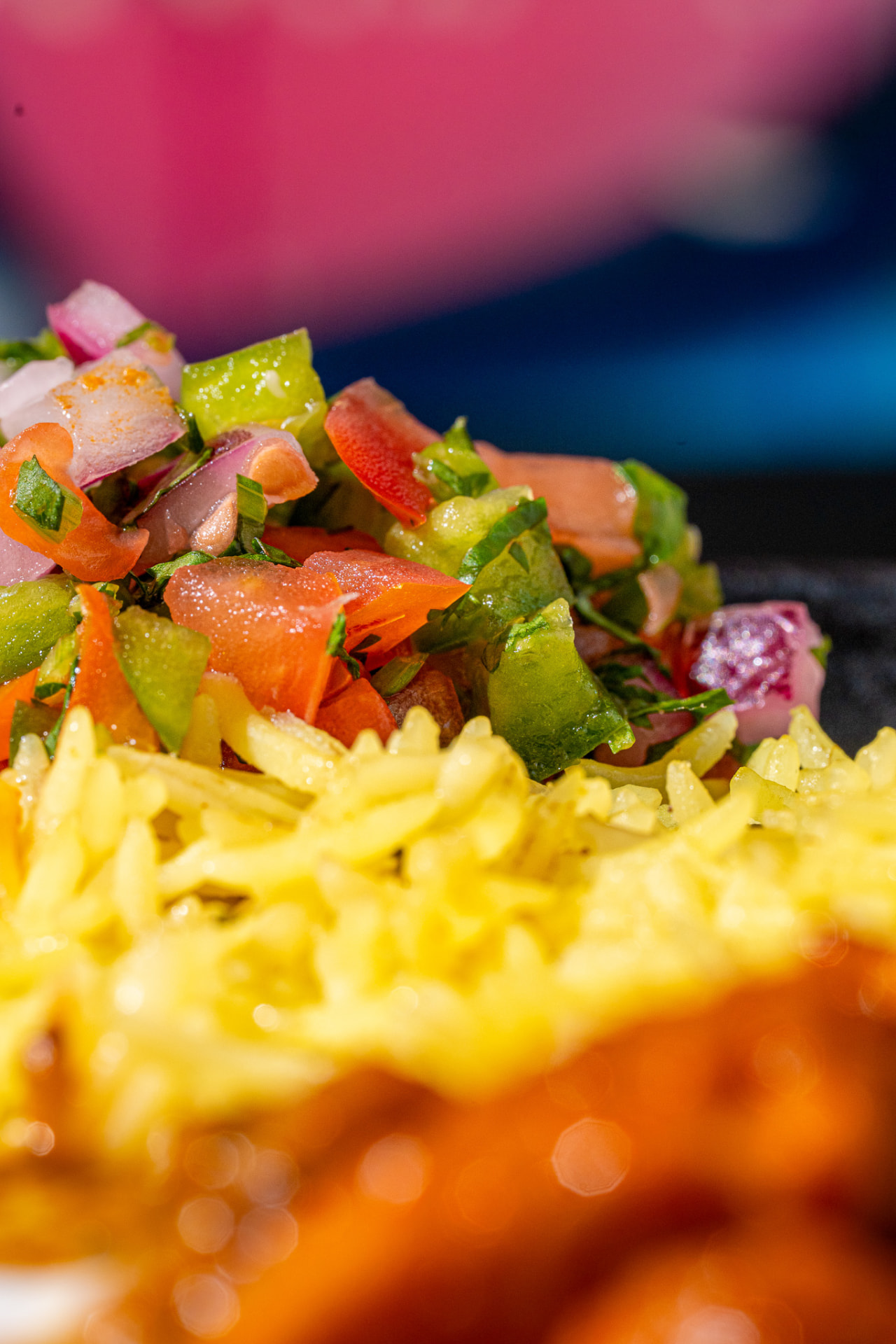 Pico de gallo over basmati rice, macro