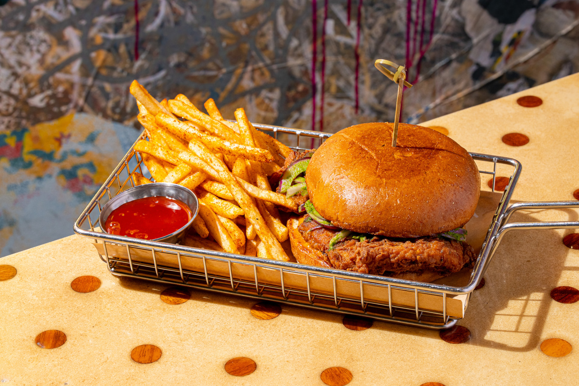 Tandoori chicken sandwich in the basket with peri-peri fries
