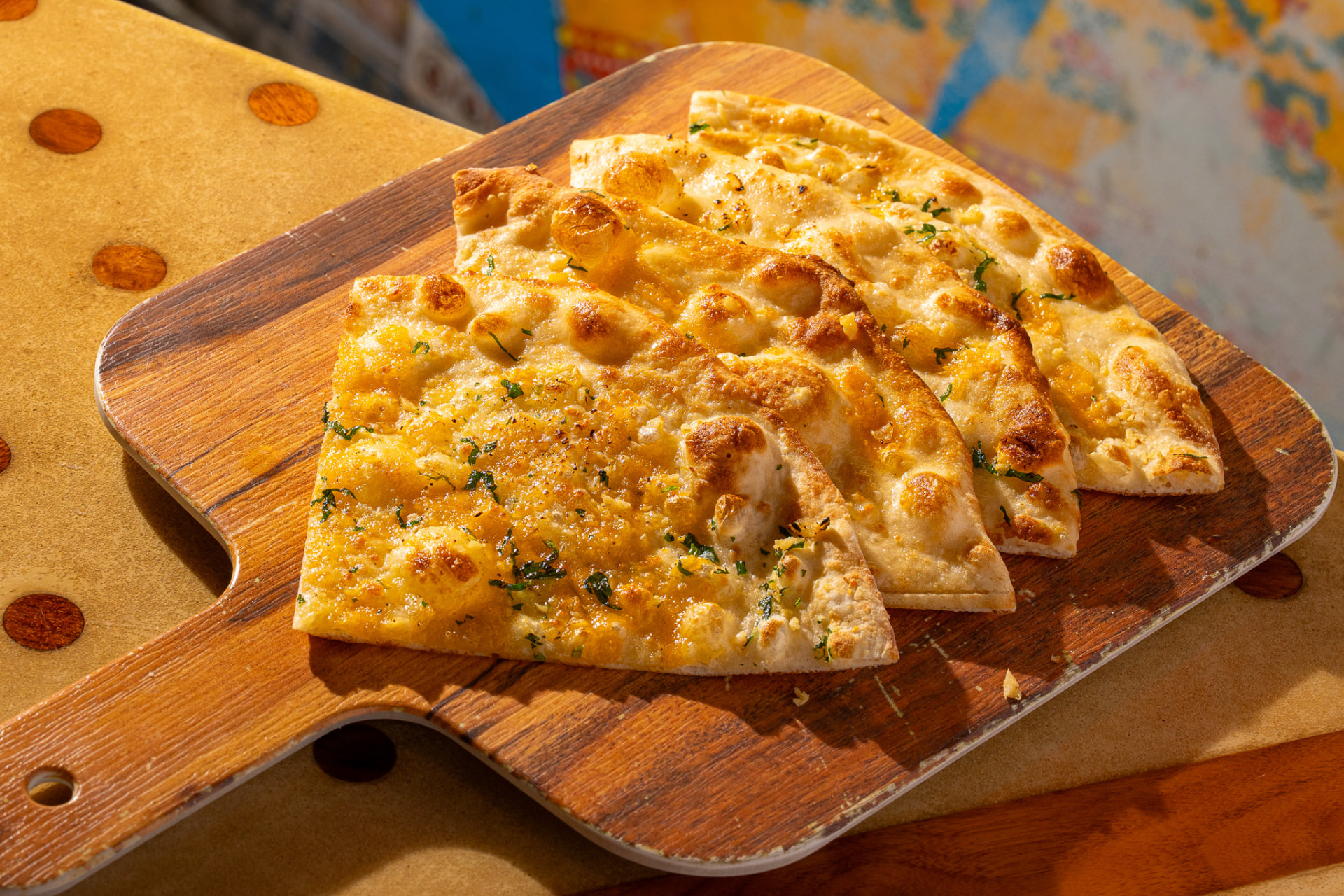 Garlic naan on the board
