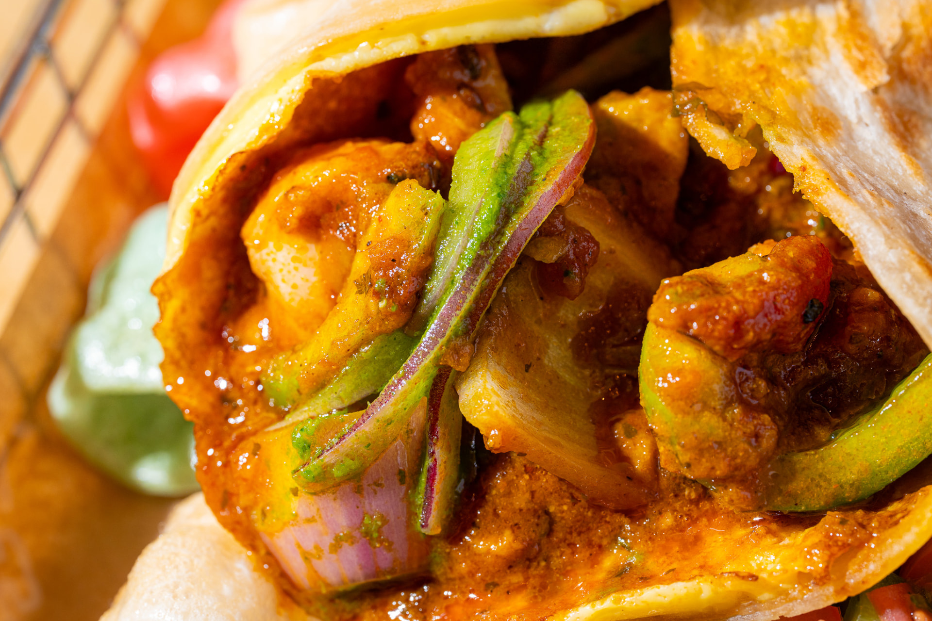 Kathi roll with fryums and pico, macro on the egg wrapped filling
