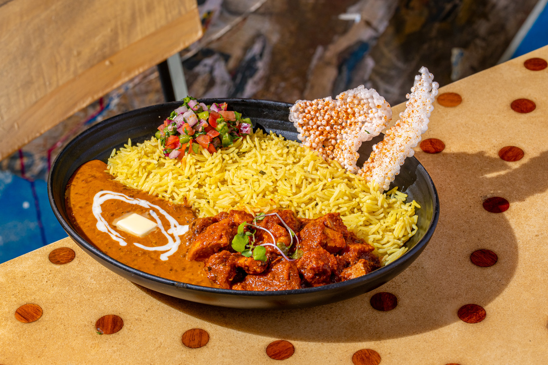 Tikka masala bowl with daal, rice, pico and sago papad