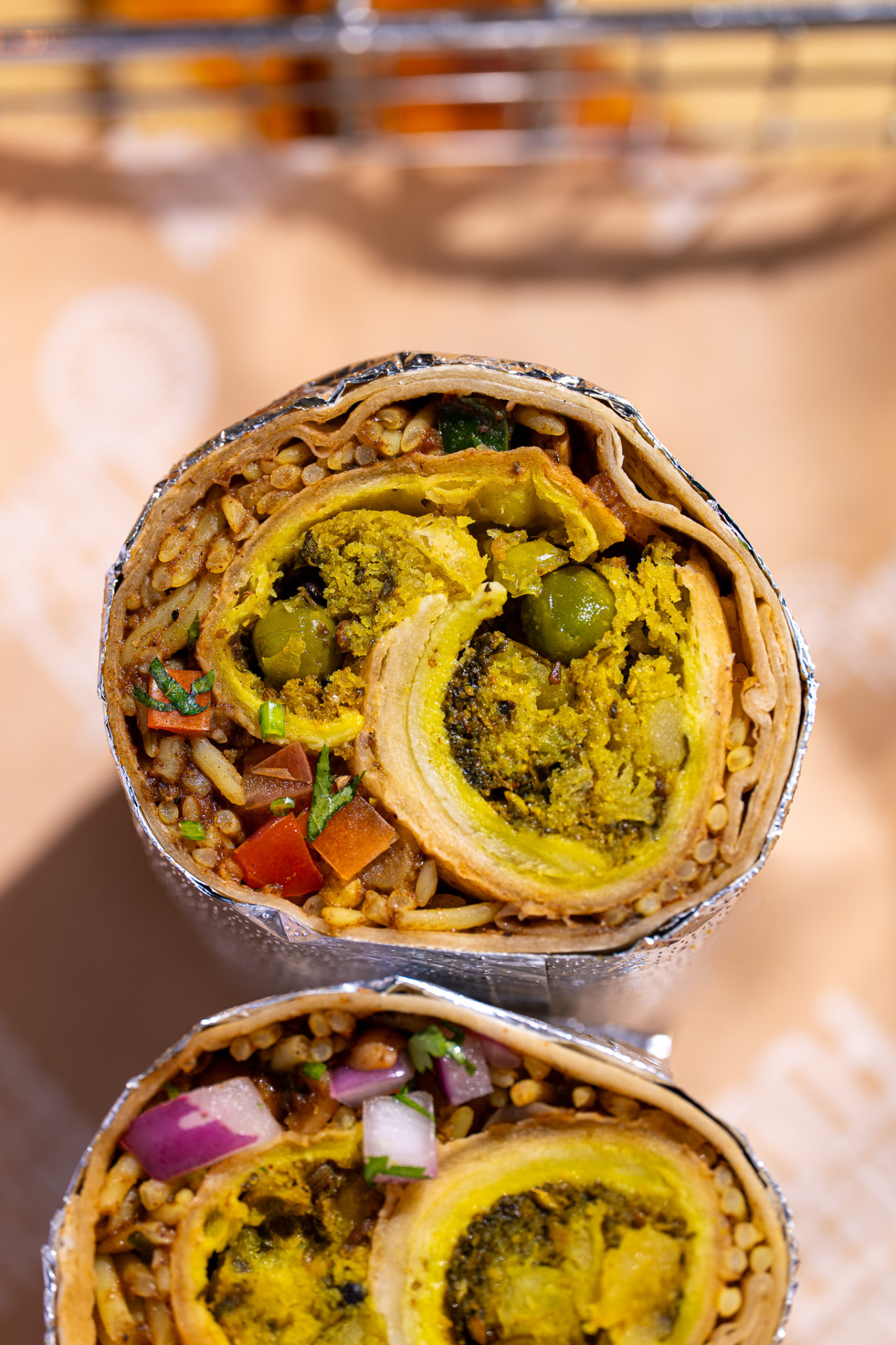 Hella Vegan burrito, samosa spiral in view