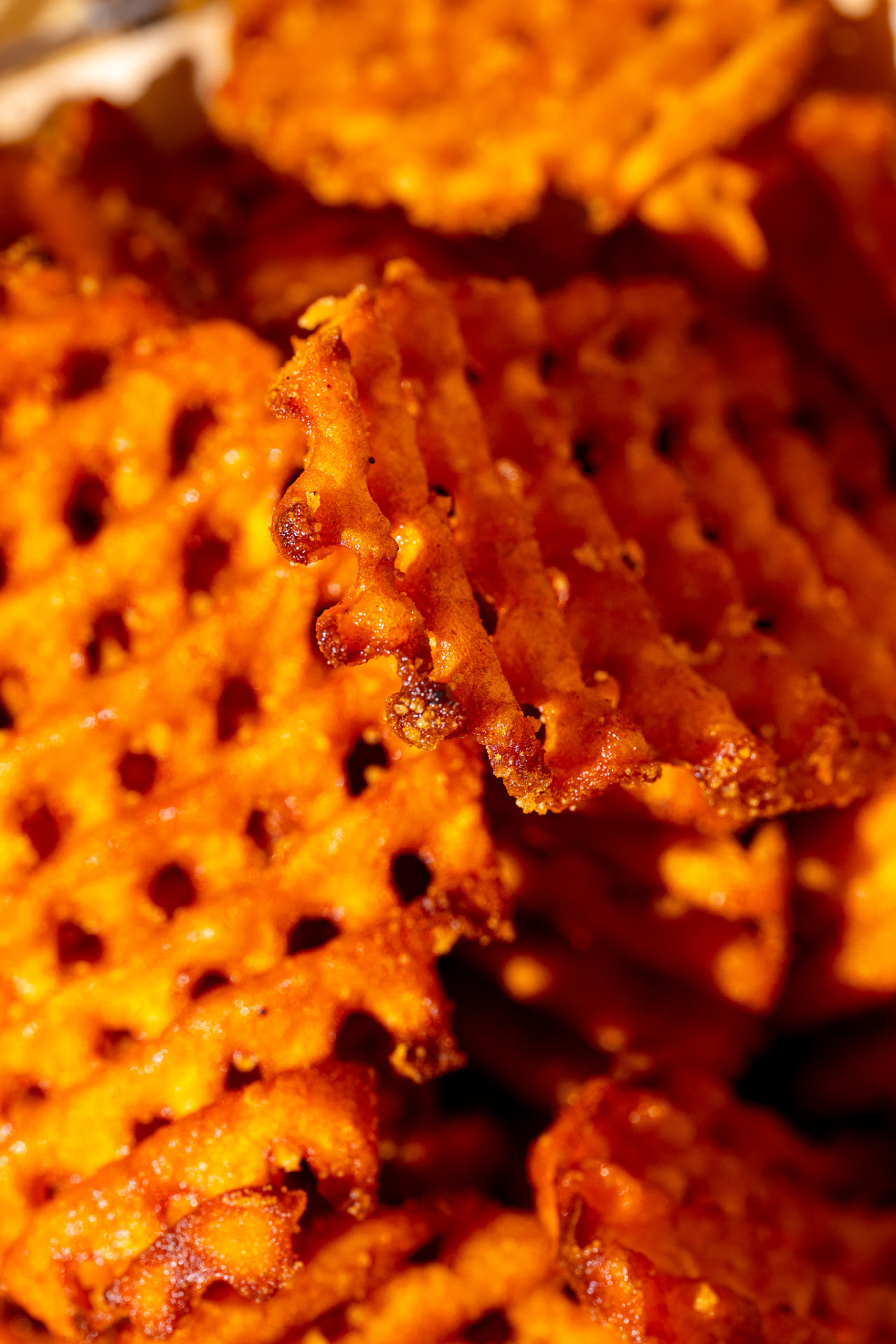 Sweet potato waffle fries, macro on the crisp edges