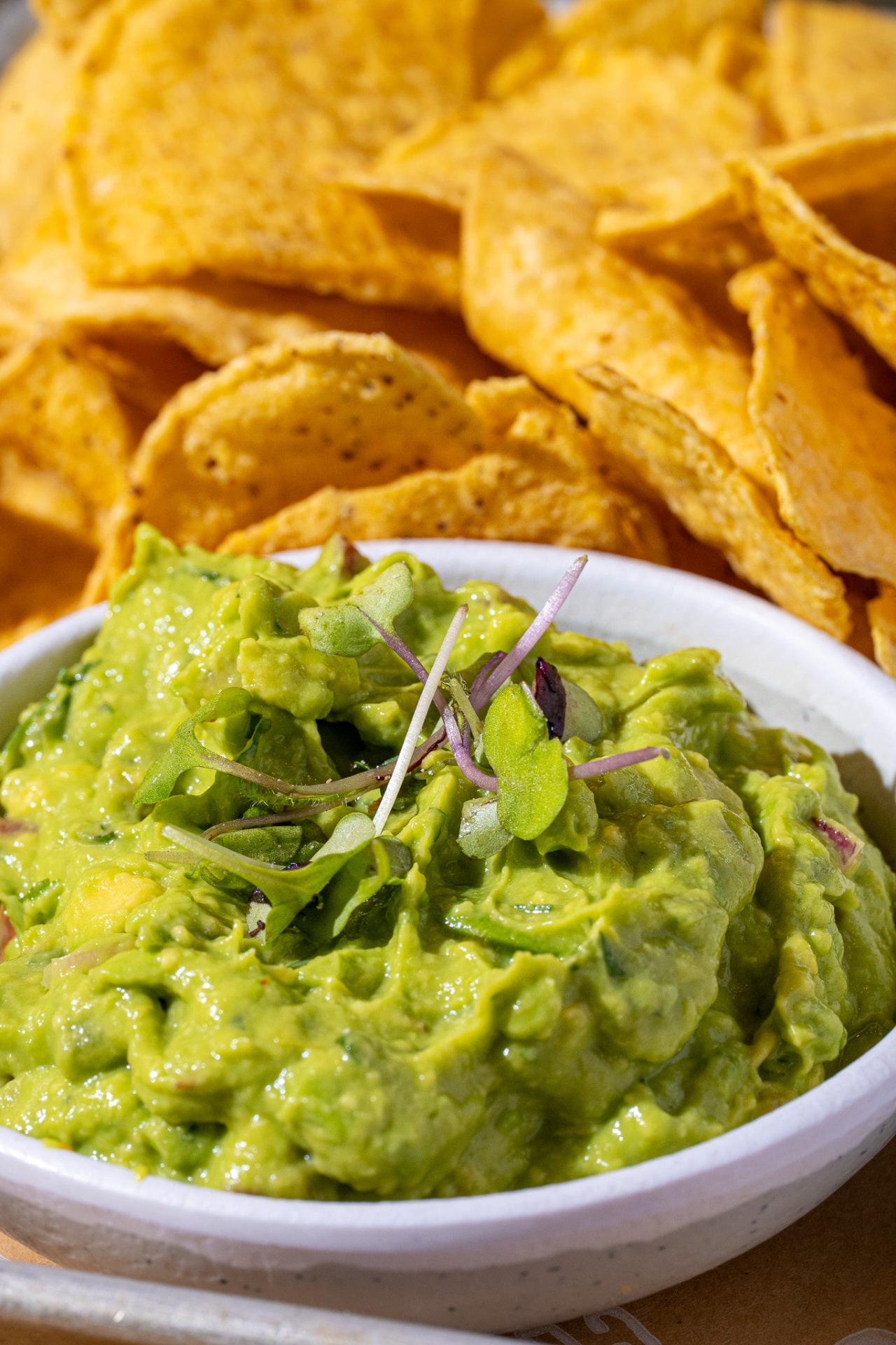 Guac and chips, close up on the guac