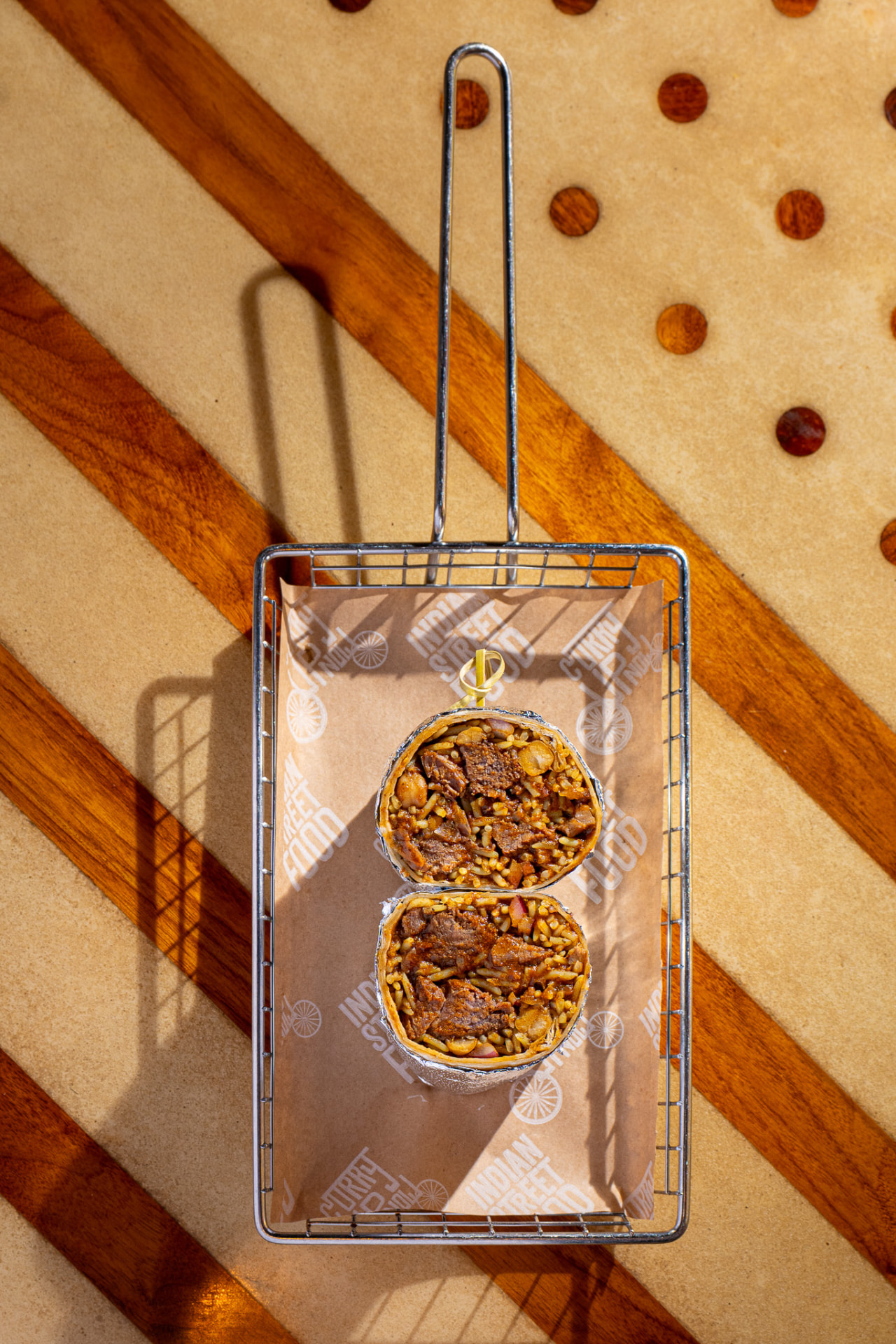 Lamb burrito in the basket, overhead