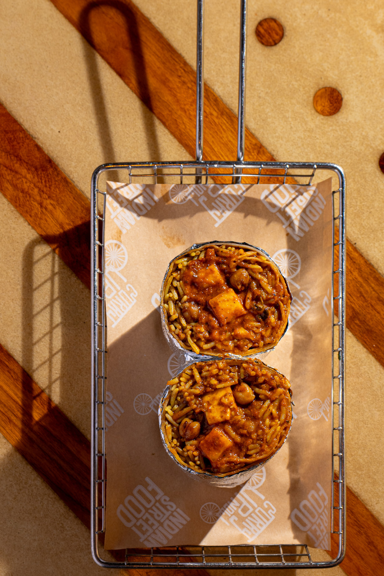 Paneer tikka masala burrito in the basket