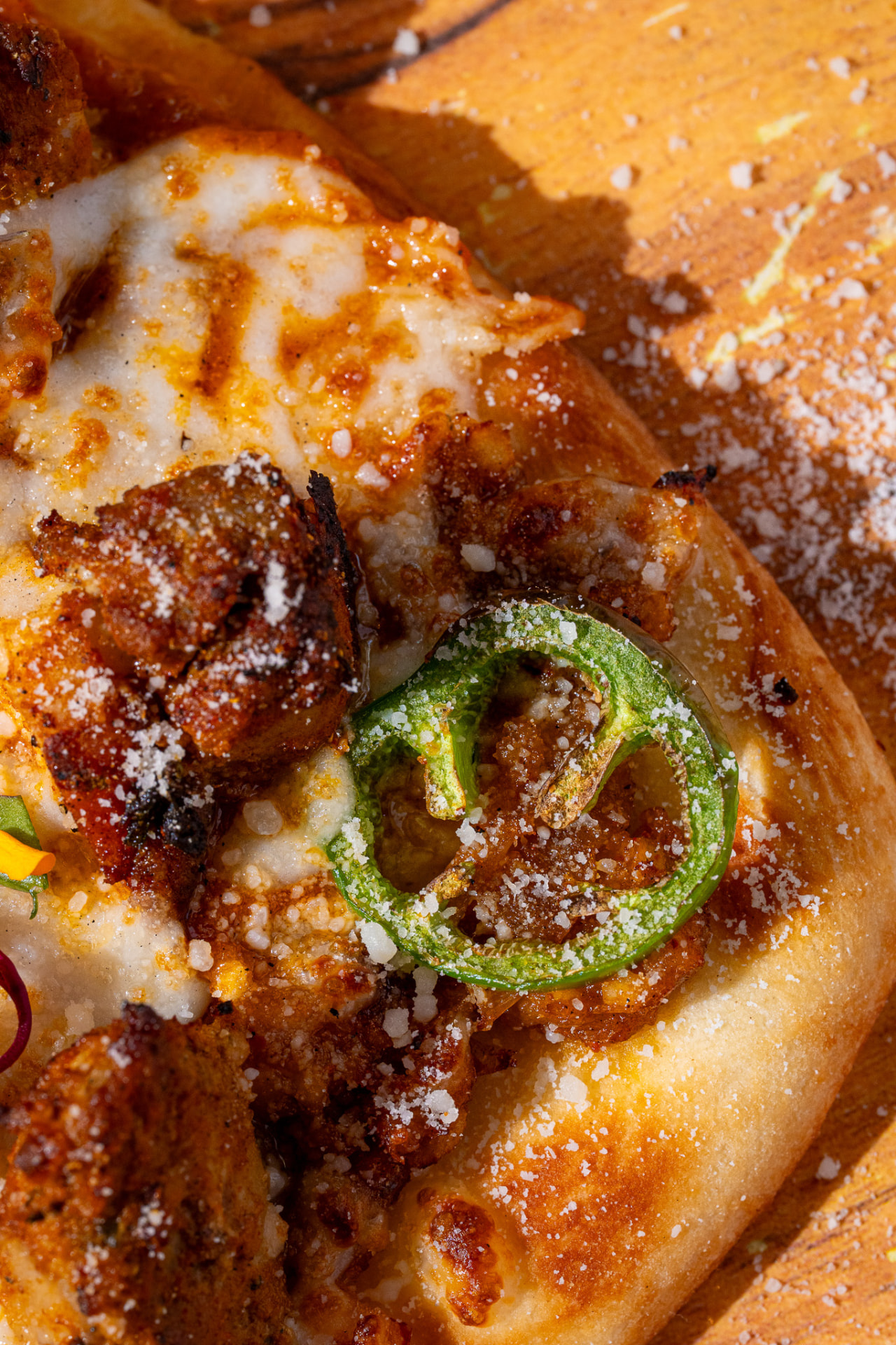 Chicken Naughty Naan, macro on the crust and jalapeno