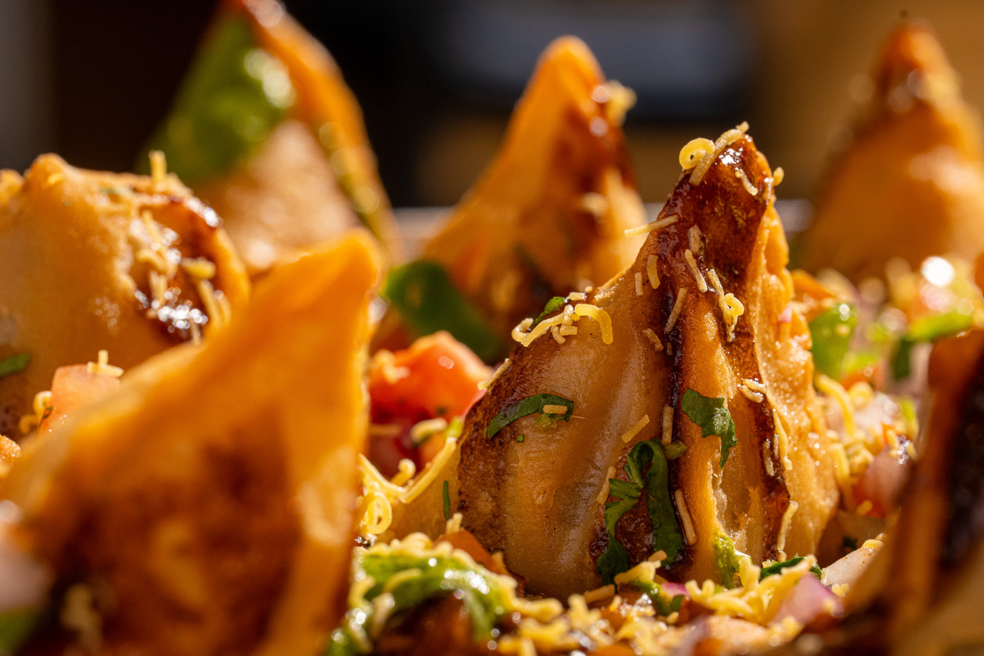 Mini samosas with pico, sev and cilantro, macro